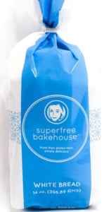 Package of Superfree Bakehouse gluten free bread on a white background.