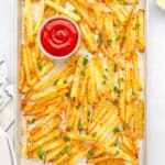 crispy easy homemade baked parmesan truffle fries recipe with garlic