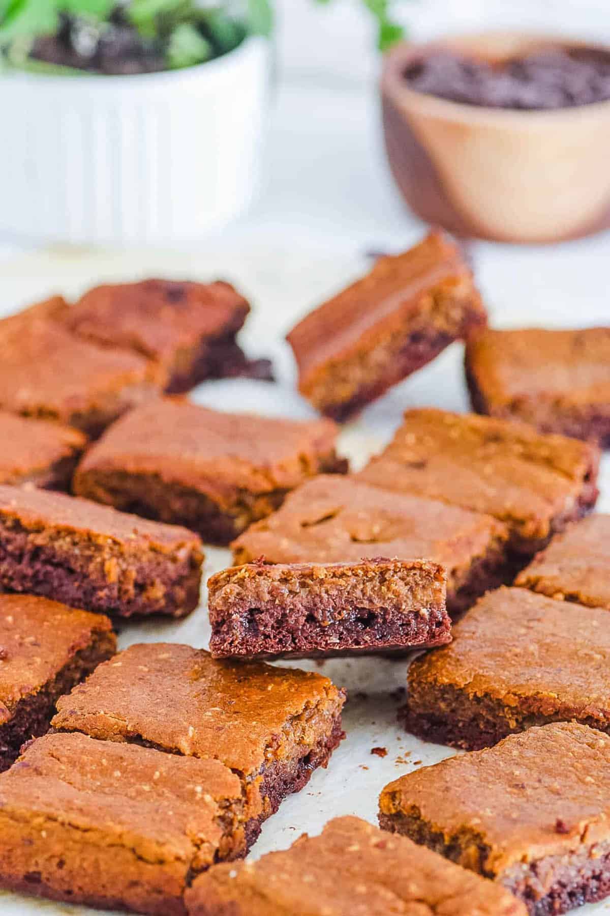 Easy healthy pumpkin brownies on parchment paper.