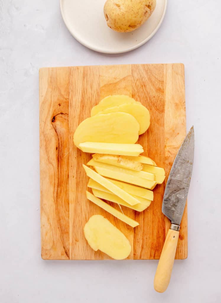 potatoes cut on a cutting board