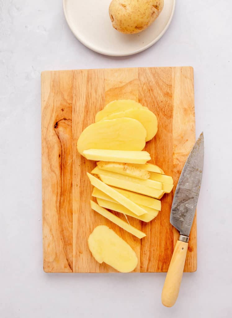 ،atoes cut on a cutting board