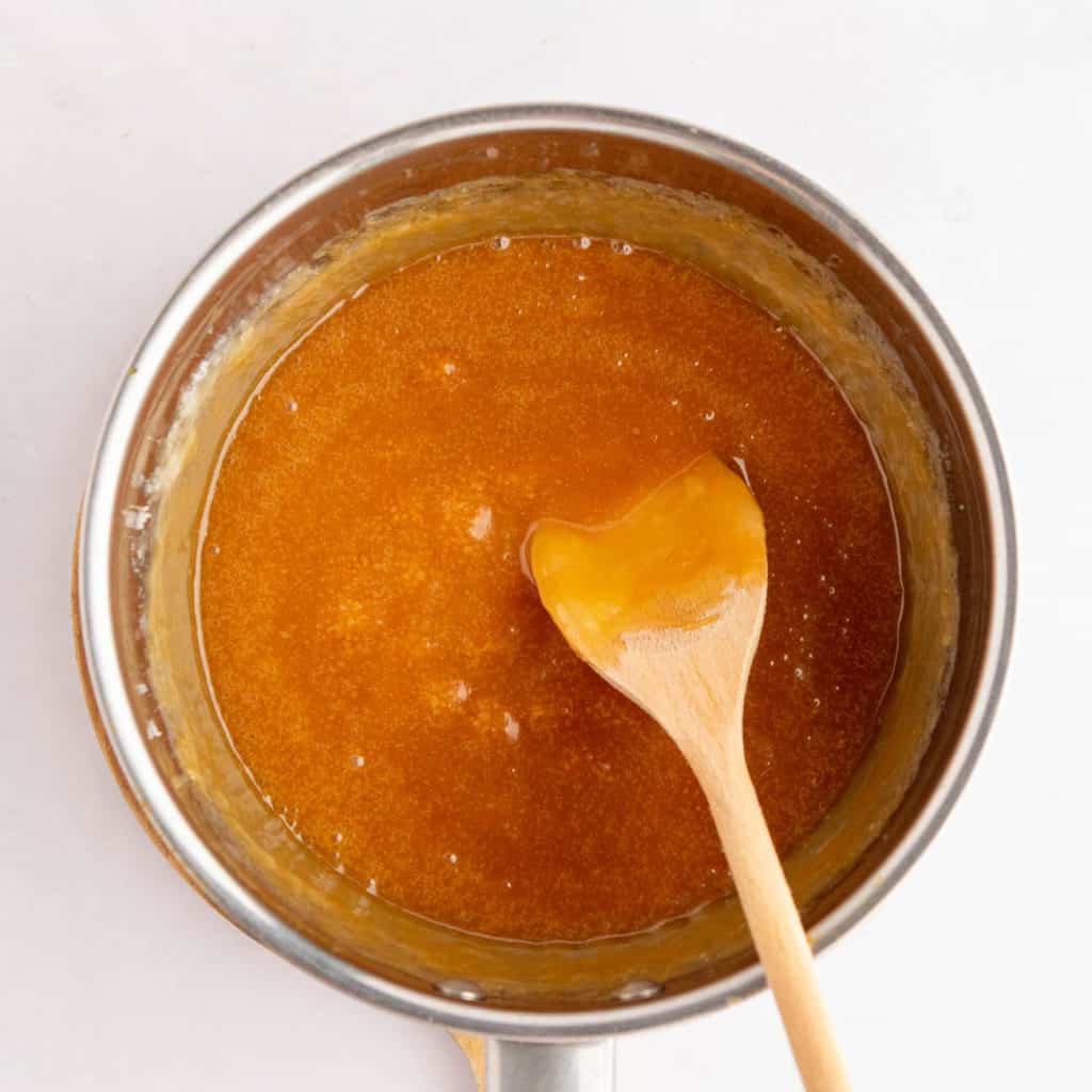 salted caramel sauce cooking in a pot