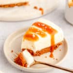 slice of easy salted caramel cheesecake no bake recipe with a bite taken out of it