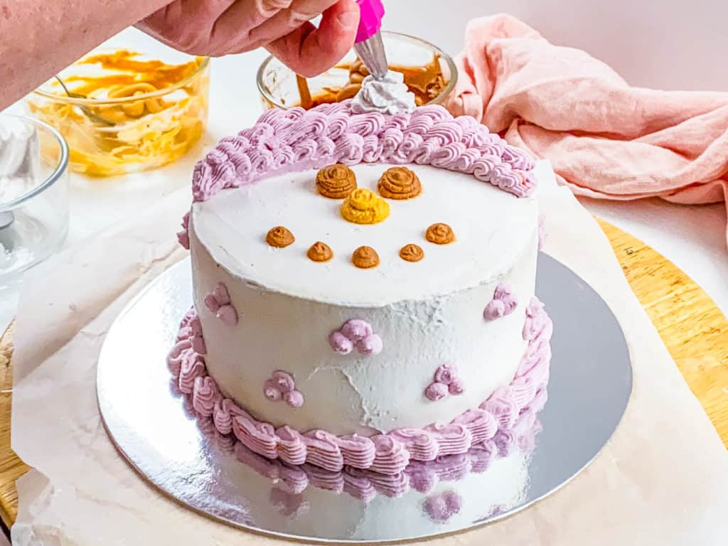 finished homemade winter onederland cake - snowman birthday cake recipe