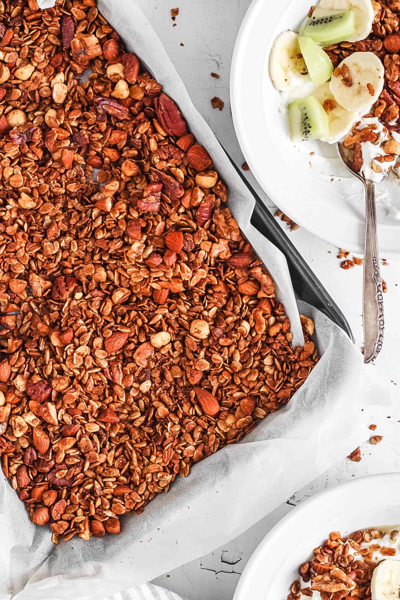 homemade easy gluten free high protein granola recipe on a baking sheet