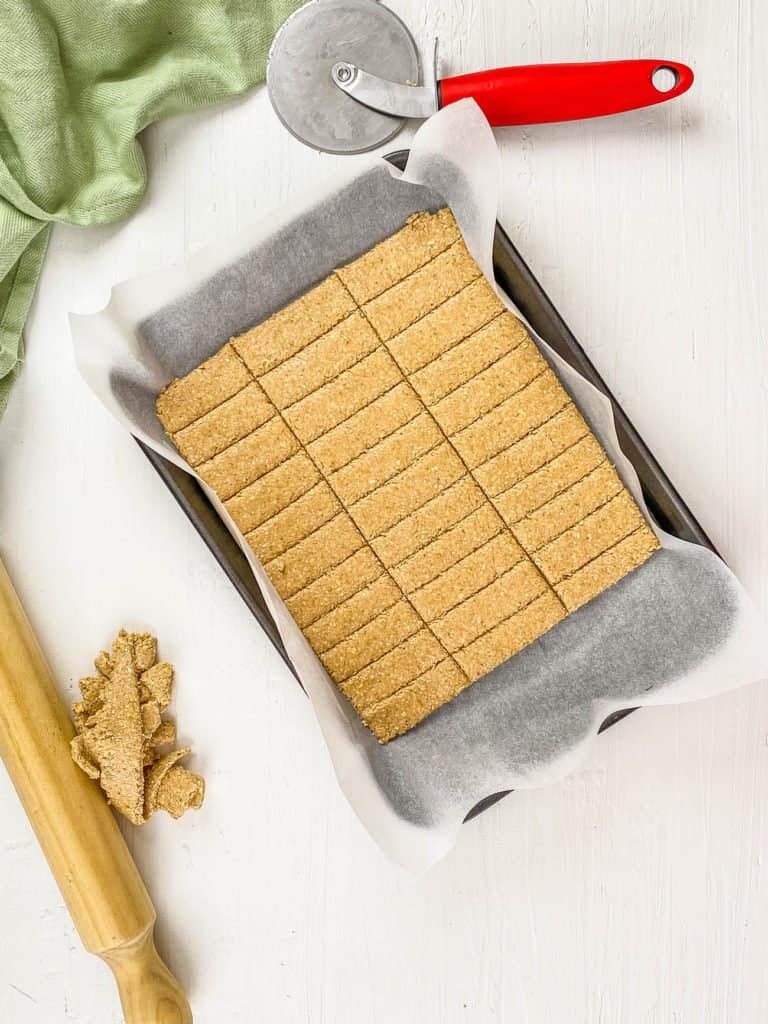 cut dough on a baking sheet