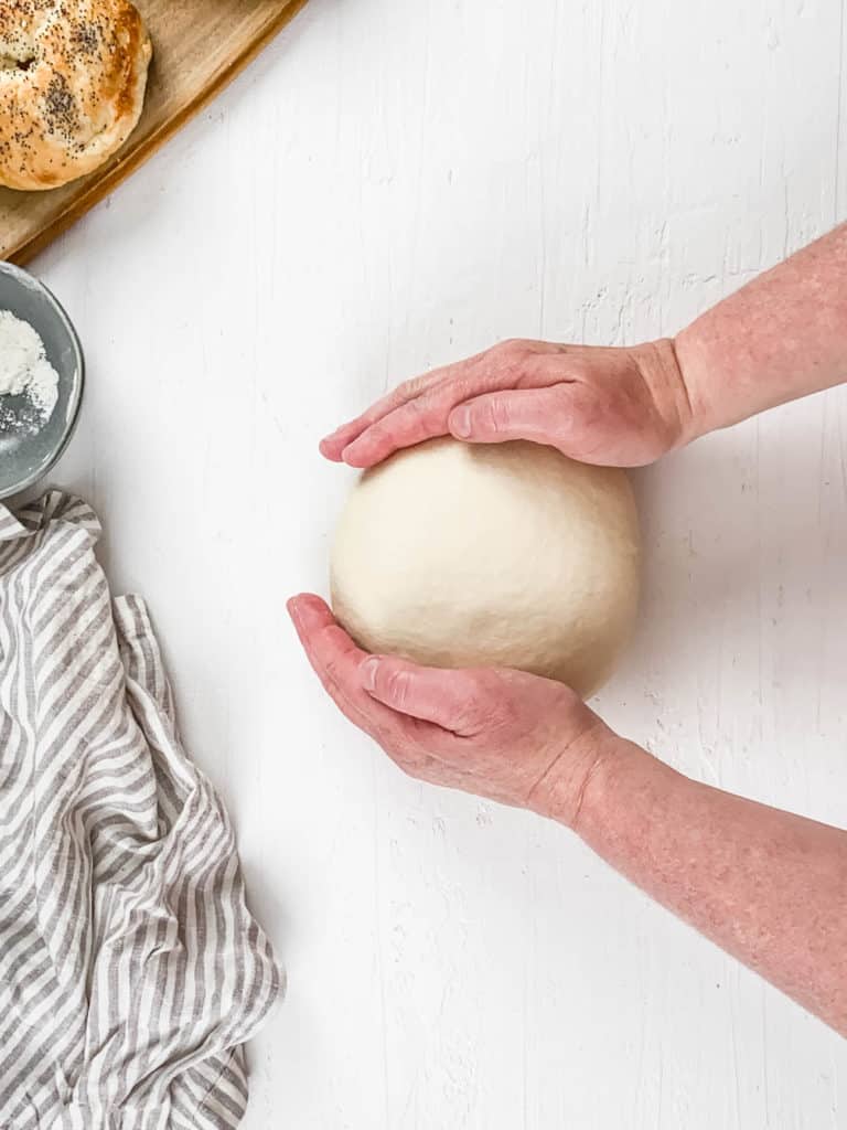 ball of dough on a cutting board