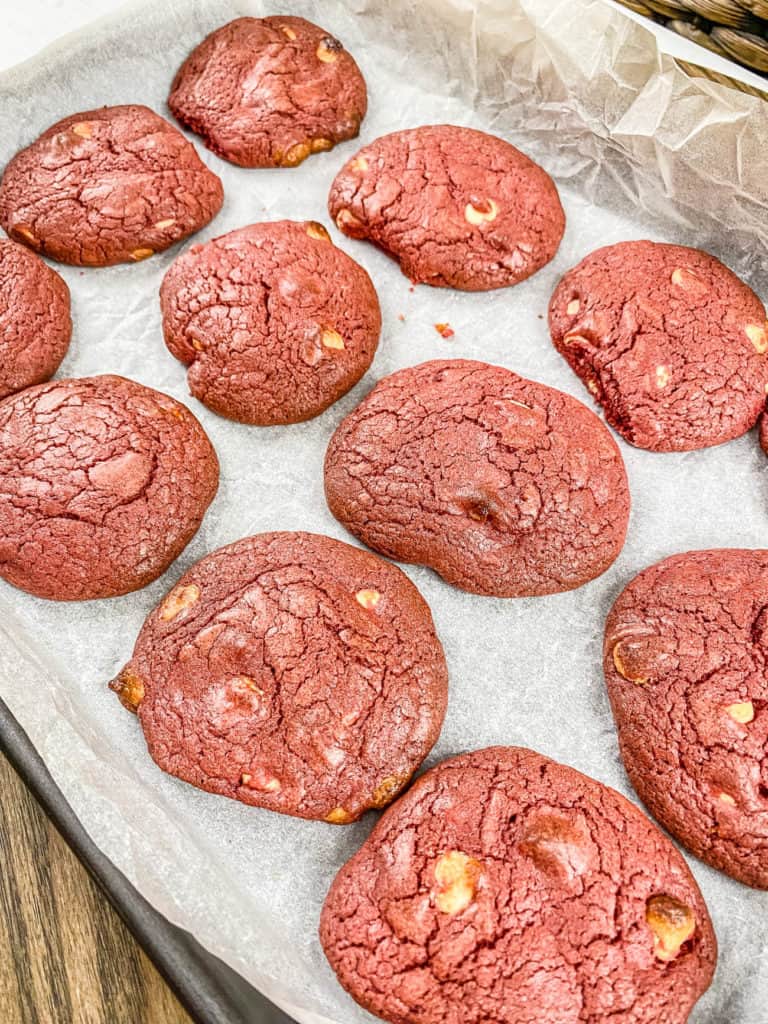 red velvet crinkle cake mix cookies on a baking sheet