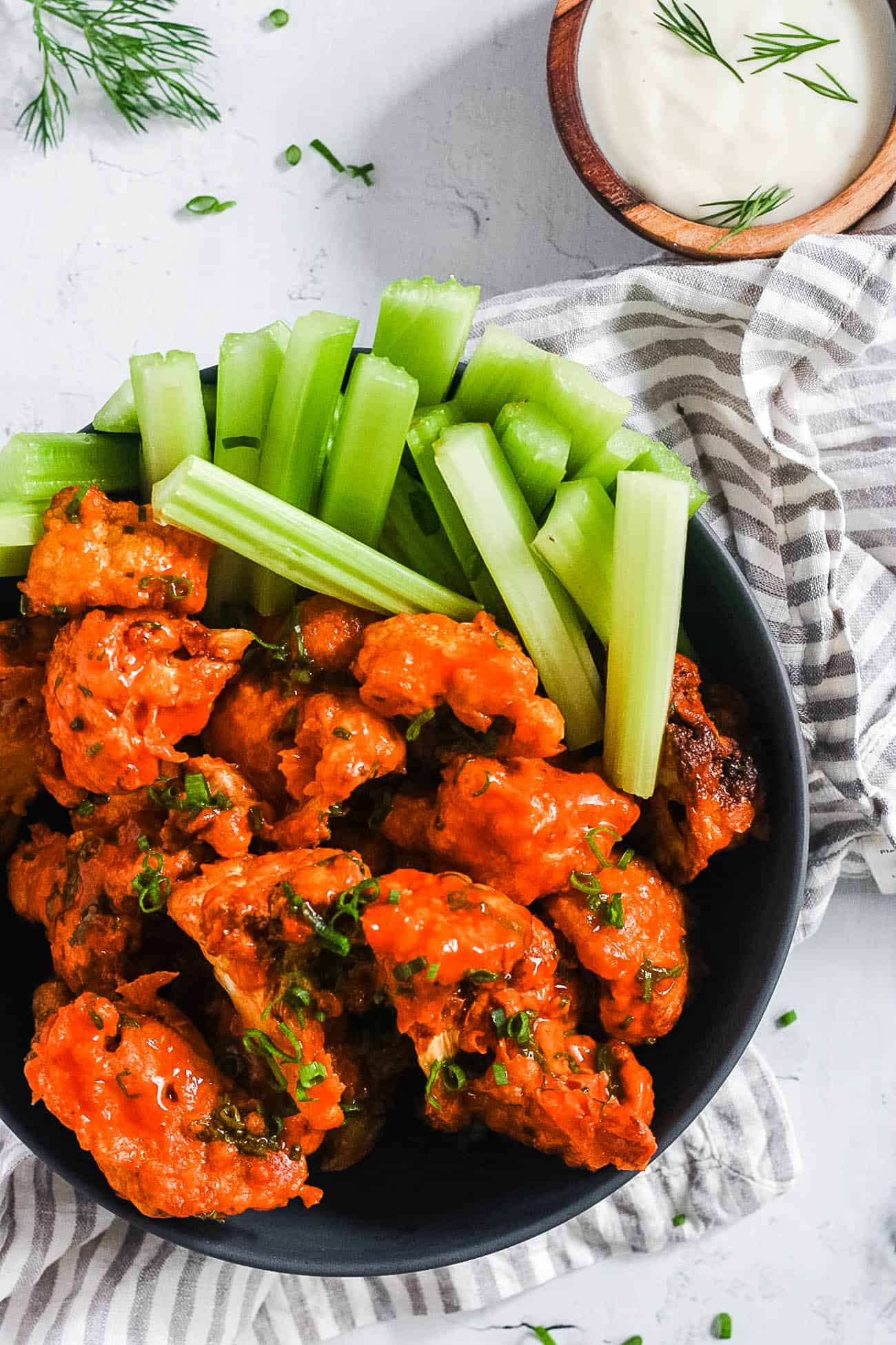 crispy easy vegan air fryer buffalo cauliflower wings recipe in a bowl