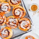 easy air fryer cinnamon rolls recipe on a baking sheet