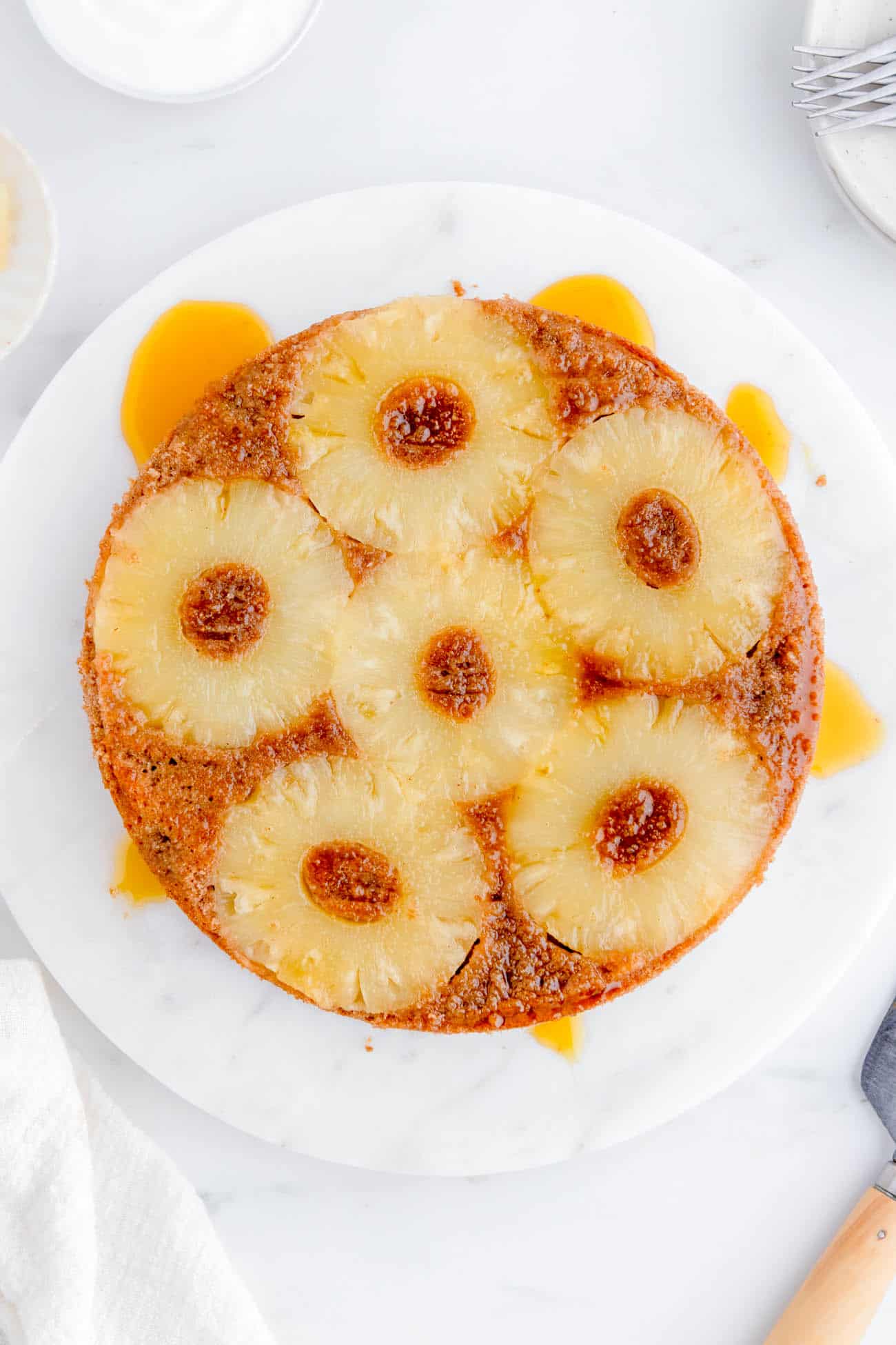 eggless vegan pineapple upside down cake recipe on a cake platter