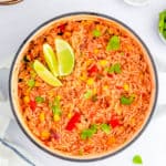 easy vegetarian vegan mexican rice recipe - healthy spanish rice in a stock pot