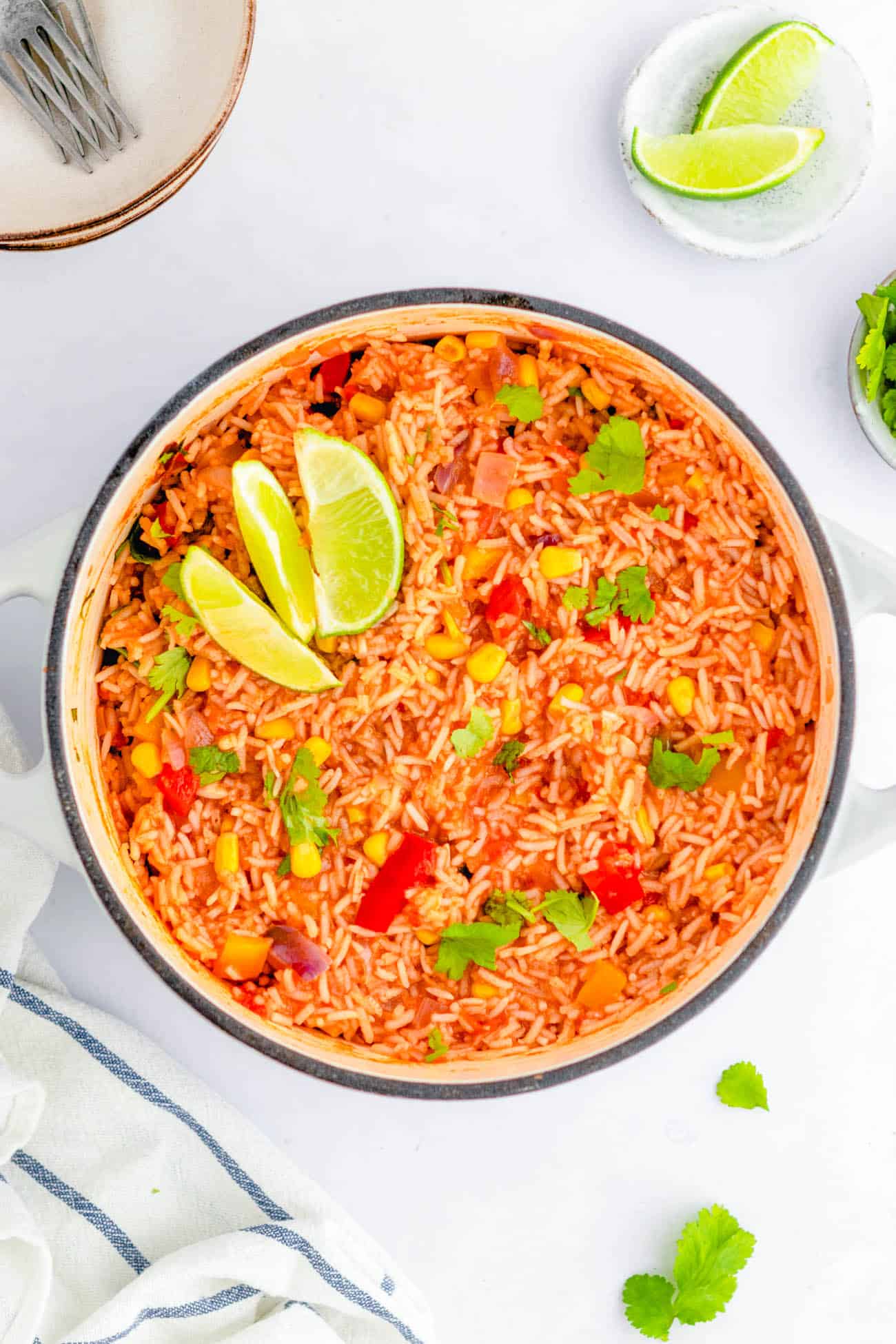 easy vegetarian vegan mexican rice recipe - healthy spanish rice in a stock pot