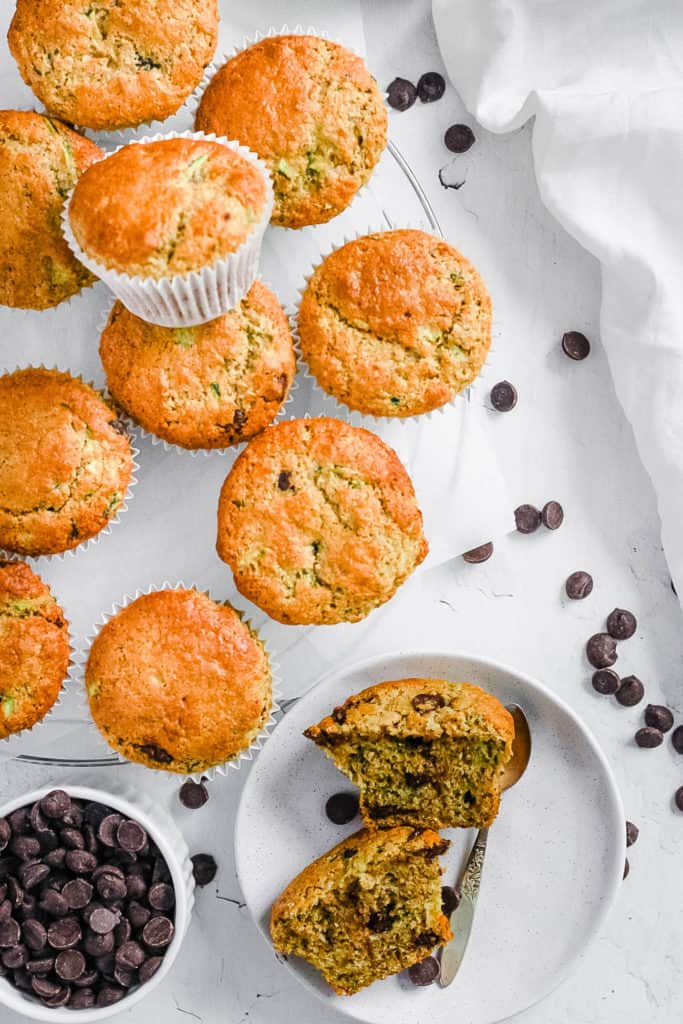 easy healthy vegan zucchini muffins - vegan chocolate zucchini muffins recipe on a white tray