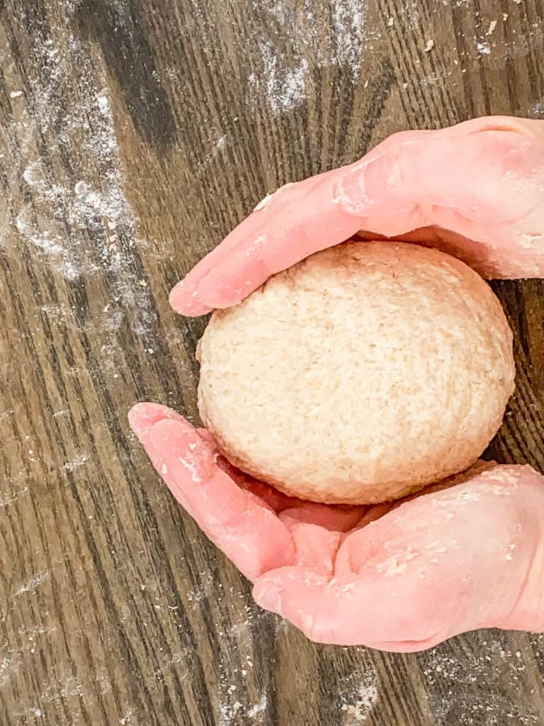 dough ball on a cutting board