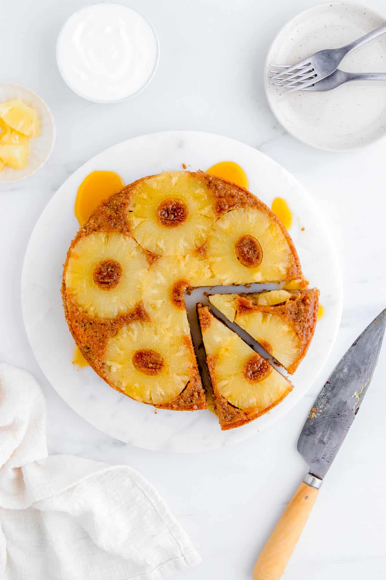 easy gluten free eggless vegan pineapple upside down cake recipe on a cake platter