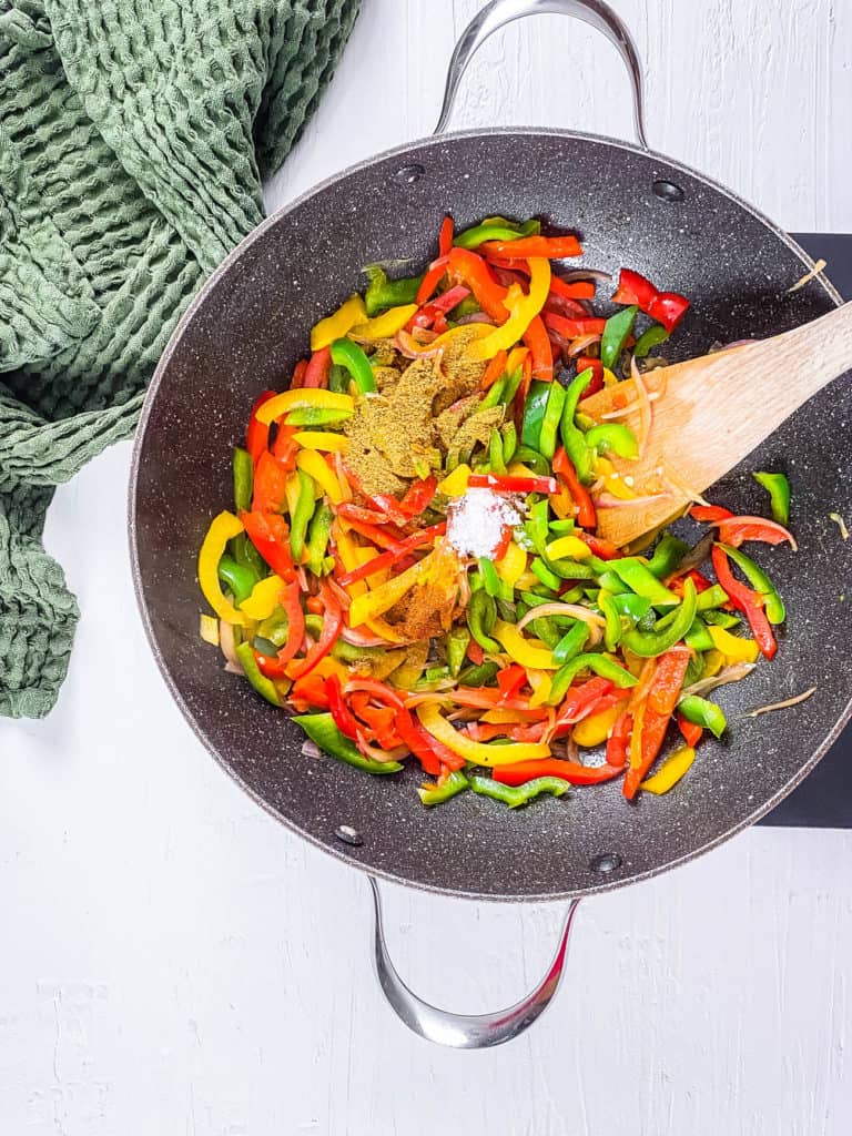 veggies sauteeing in a pan