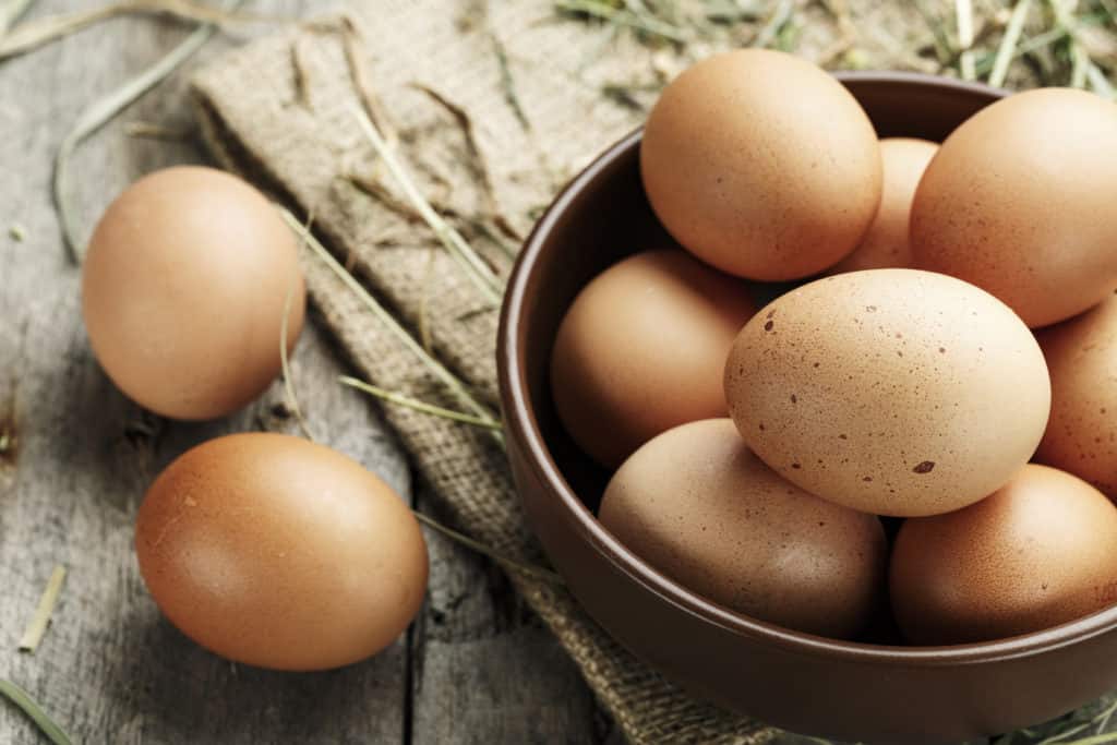 how long do farm fresh eggs last? brown eggs in a bowl