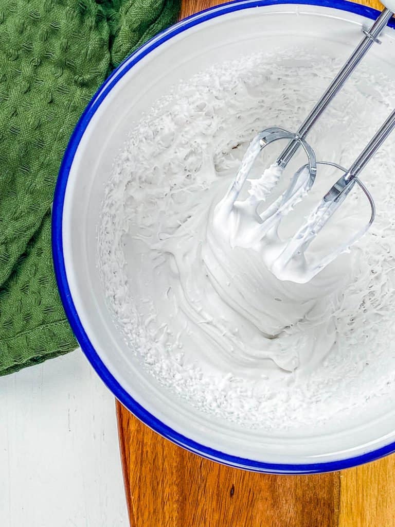 Whipping up coconut cream in a bowl.