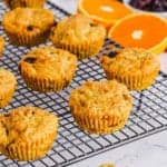 easy healthy vegan gluten free orange cranberry muffins recipe on a wire rack