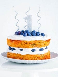 healthy first birthday smash cake recipe (low sugar, gluten free, dairy free and super easy to make!) on a cake stand