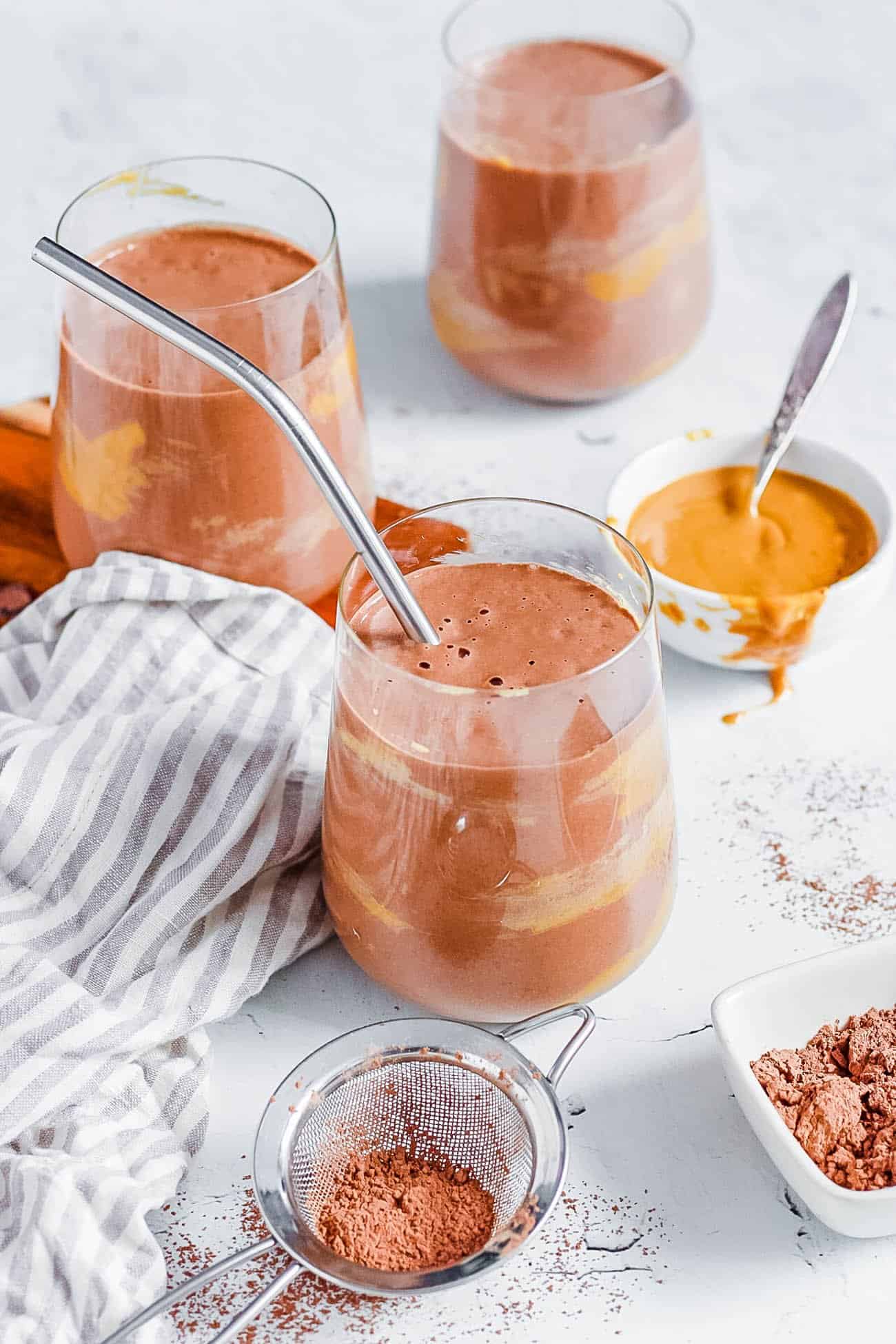 easy healthy keto low carb chocolate avocado peanut butter smoothie recipe in a glass