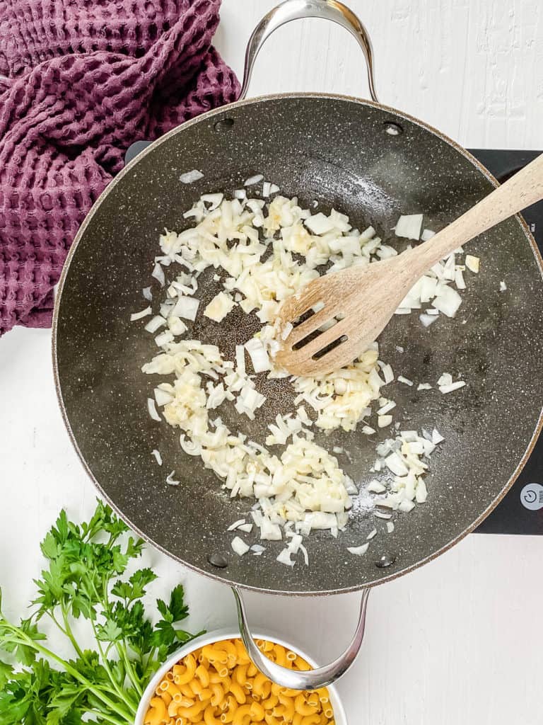 onions sauteeing in a pan