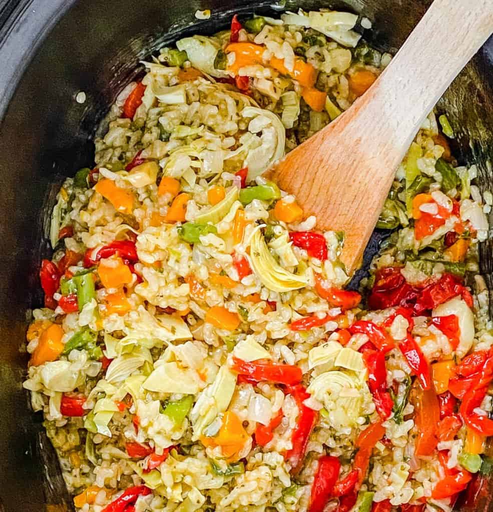 rice and veggies cooking in a pot