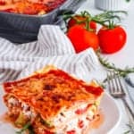 slice of easy hearty italian healthy vegetable lasagna recipe (low calorie, low fat, kid friendly vegetarian lasagna) on a white plate