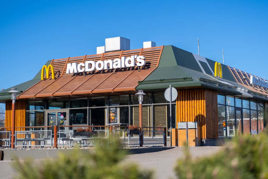 McDonalds restaurant exterior. View of the fast food restaurant on sunny day.
