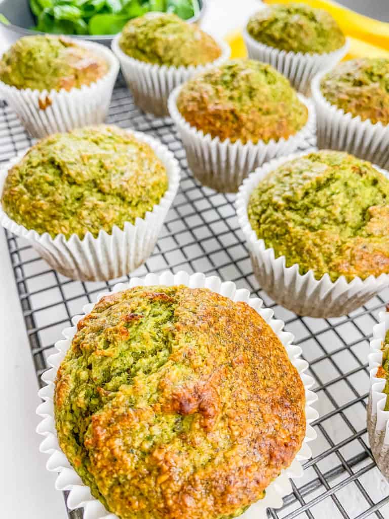 easy healthy gluten free vegan spinach banana muffins recipe - fresh out of the oven on a wire rack