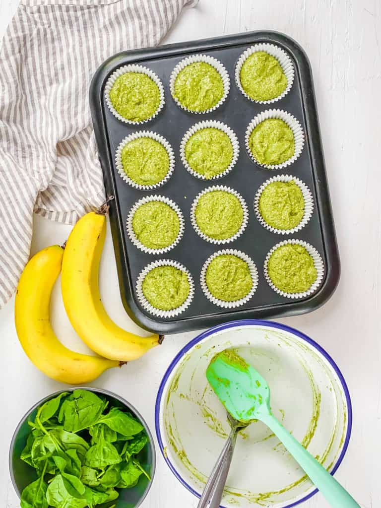 spinach blender muffins batter in muffin tin