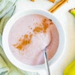 healthy easy vegan gluten free jamaican banana porridge recipe with cinnamon in a white bowl
