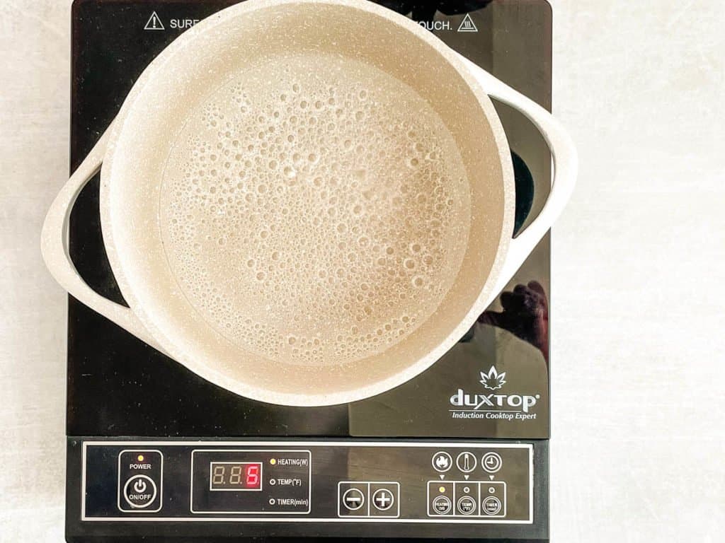 water boiling in a pot on the stove