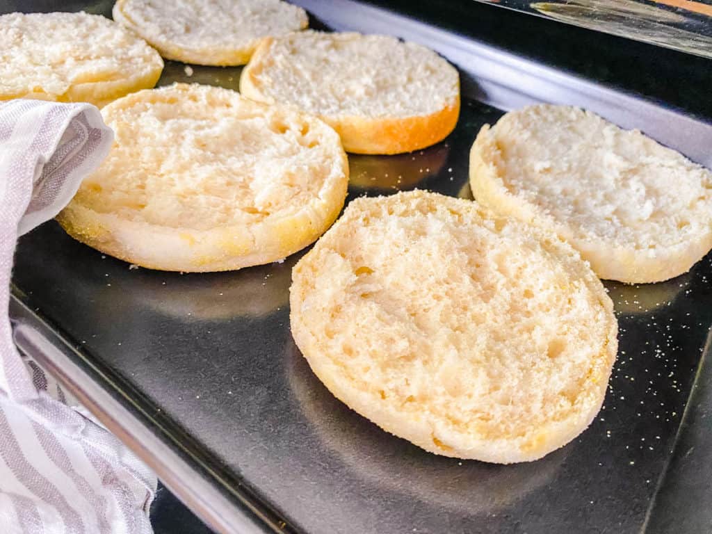 english muffins on a baking sheet