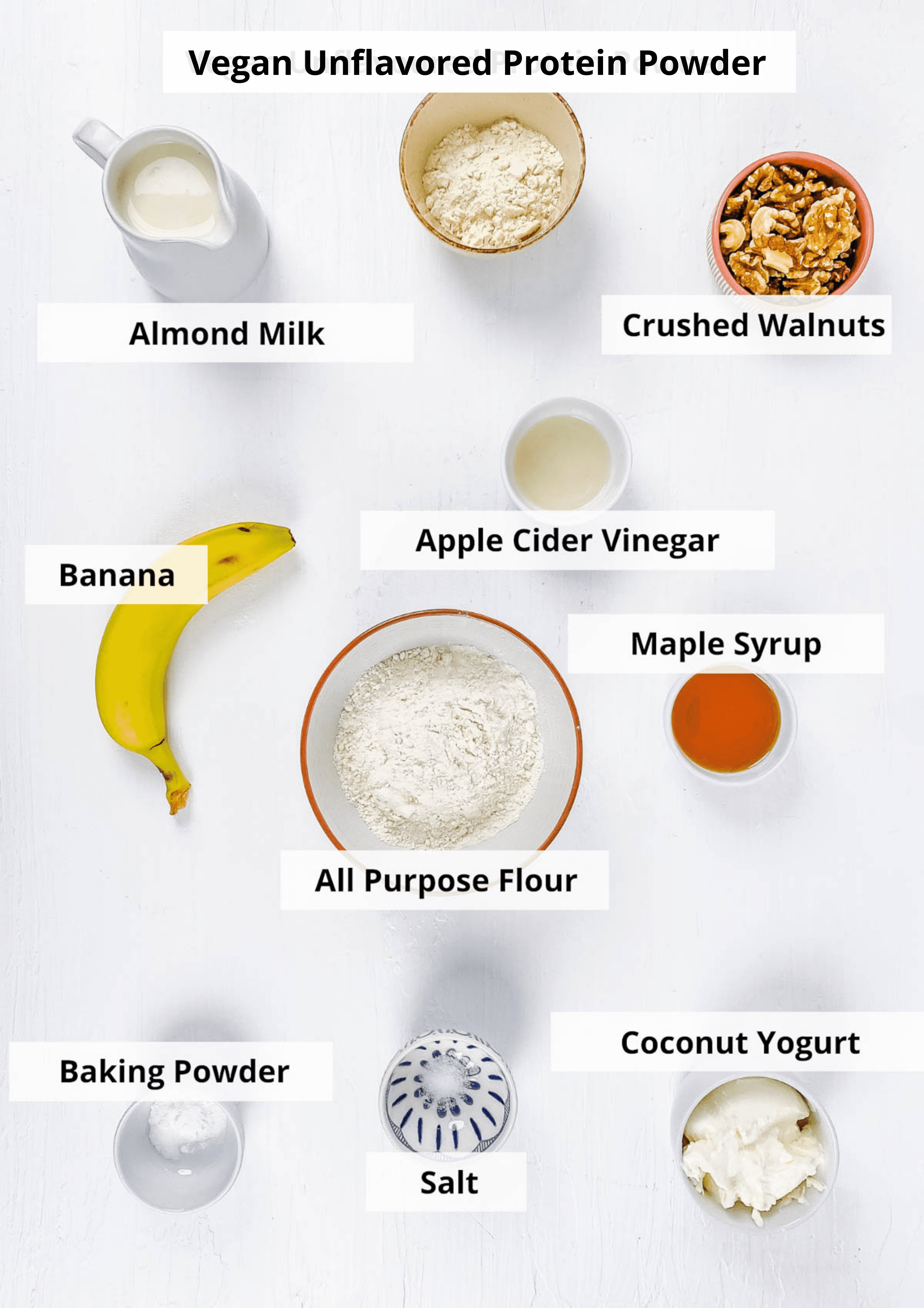 All of the ingredients for protein powder pancakes on a white background.