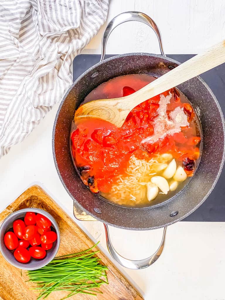 ingredients for soup added to stock pot