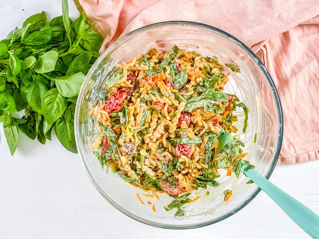 pasta salad mixed in a bowl