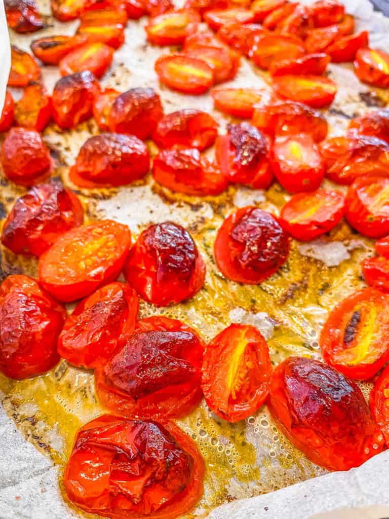 roasted tomatoes on a sheet pan