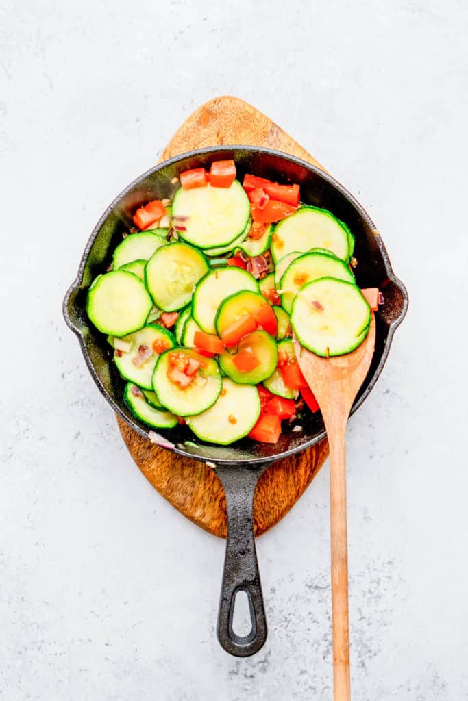 veggies sauteeing in a pan