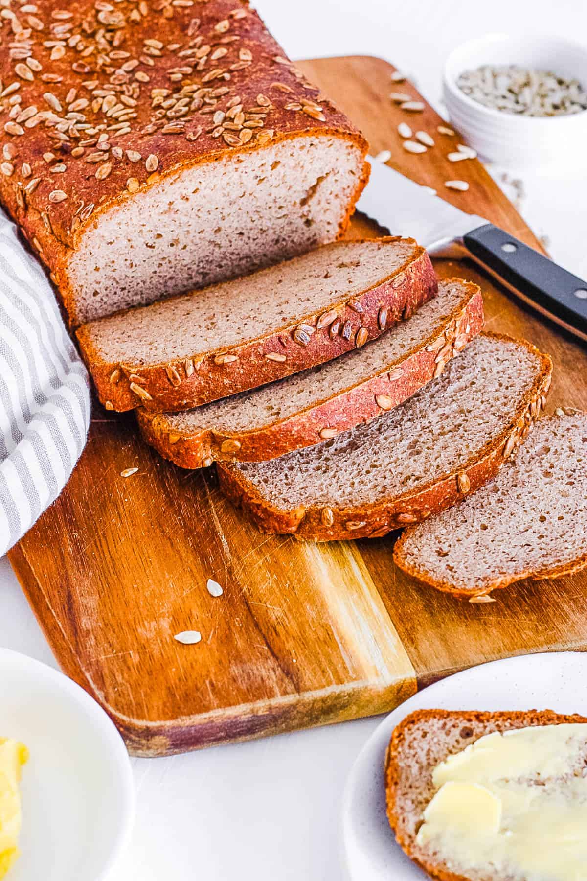 easy gluten free vegan healthy buckwheat bread recipe sliced on a cutting board