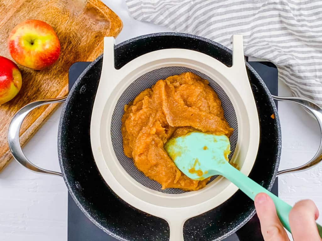 fruit puree strained in a strainer