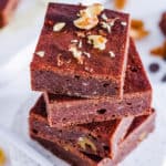 easy, healthy, vegan, dairy-free, gluten-free, egg free brownies with walnuts on a white plate