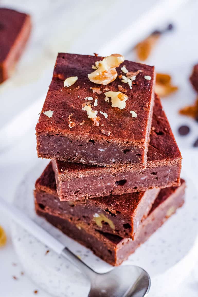 easy, healthy, vegan, dairy-free, gluten-free, egg free brownies with walnuts on a white plate