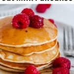 a stack of oat milk pancakes with raspberries