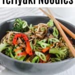 a bowl of teriyaki noodles with veggies