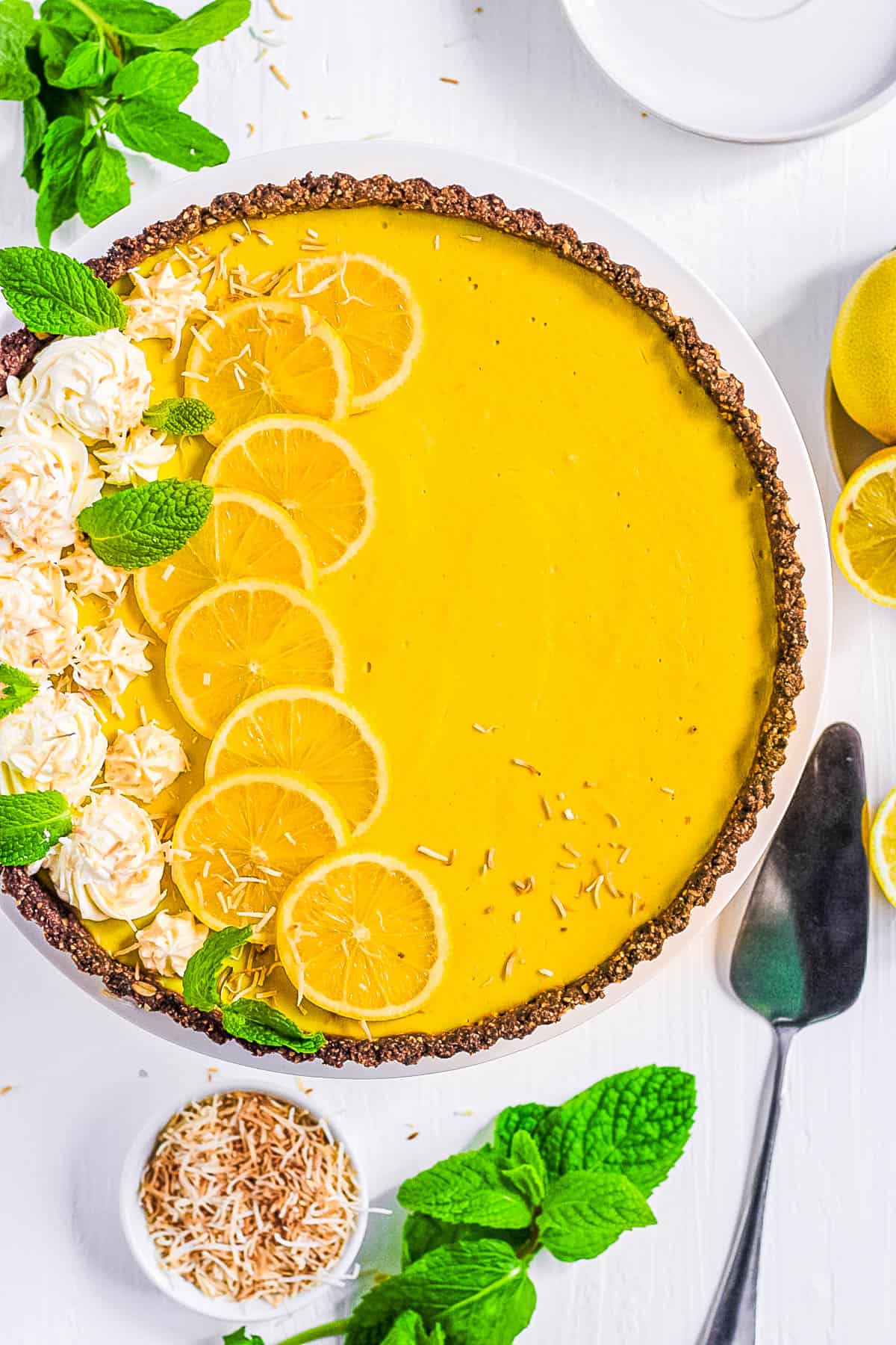 easy, healthy, gluten free vegan lemon tart recipe on a white plate