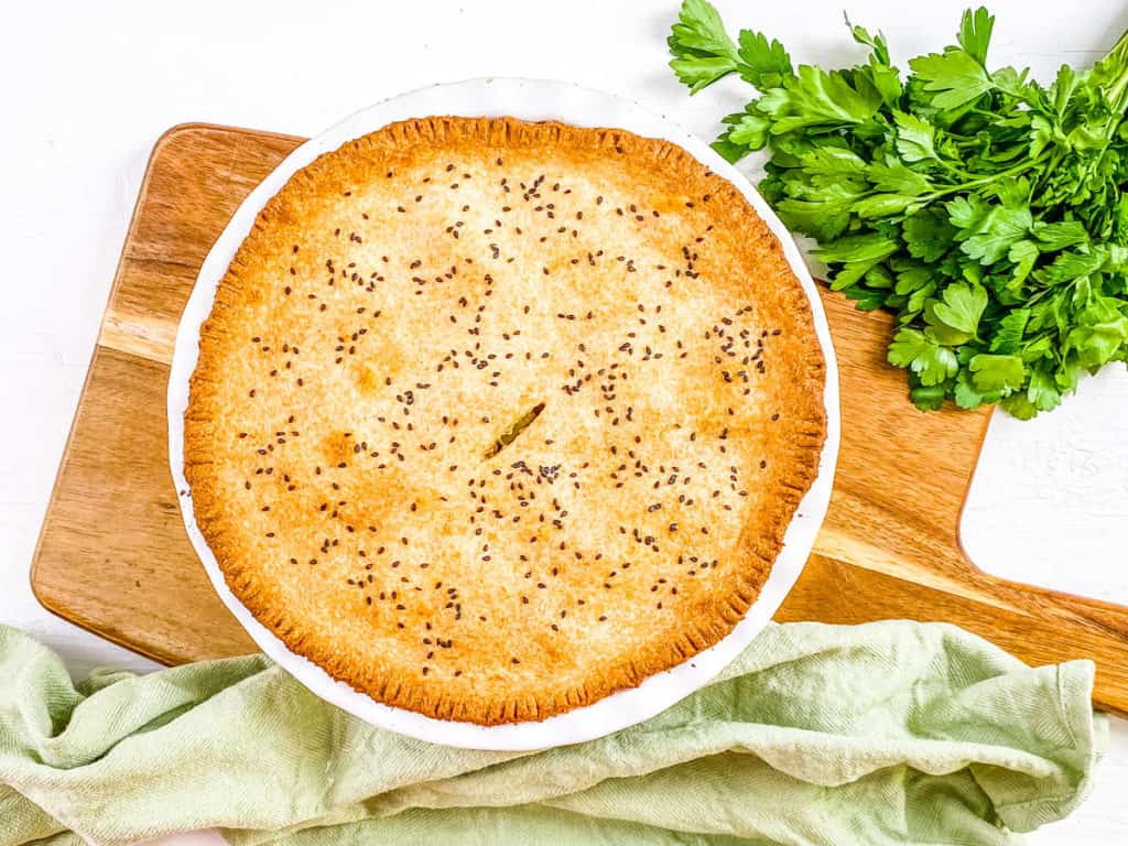 baked vegan pot pie on a cutting board