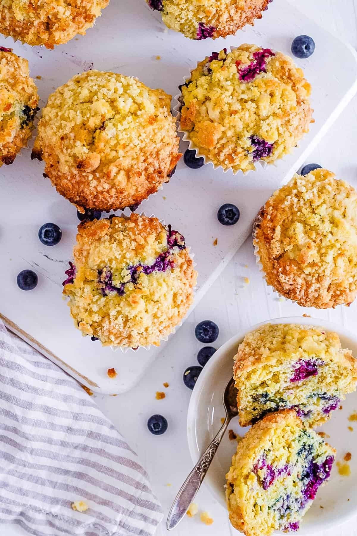 easy healthy blueberry sourdough muffins on a white plate