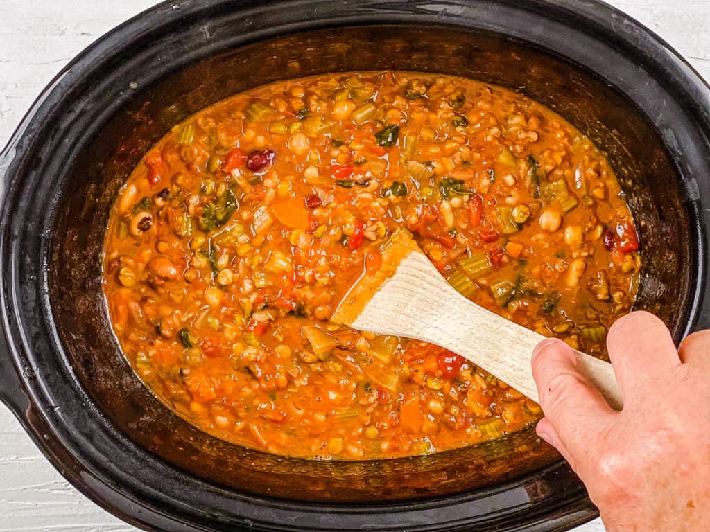 beans and veggies cooking in a slow cooker